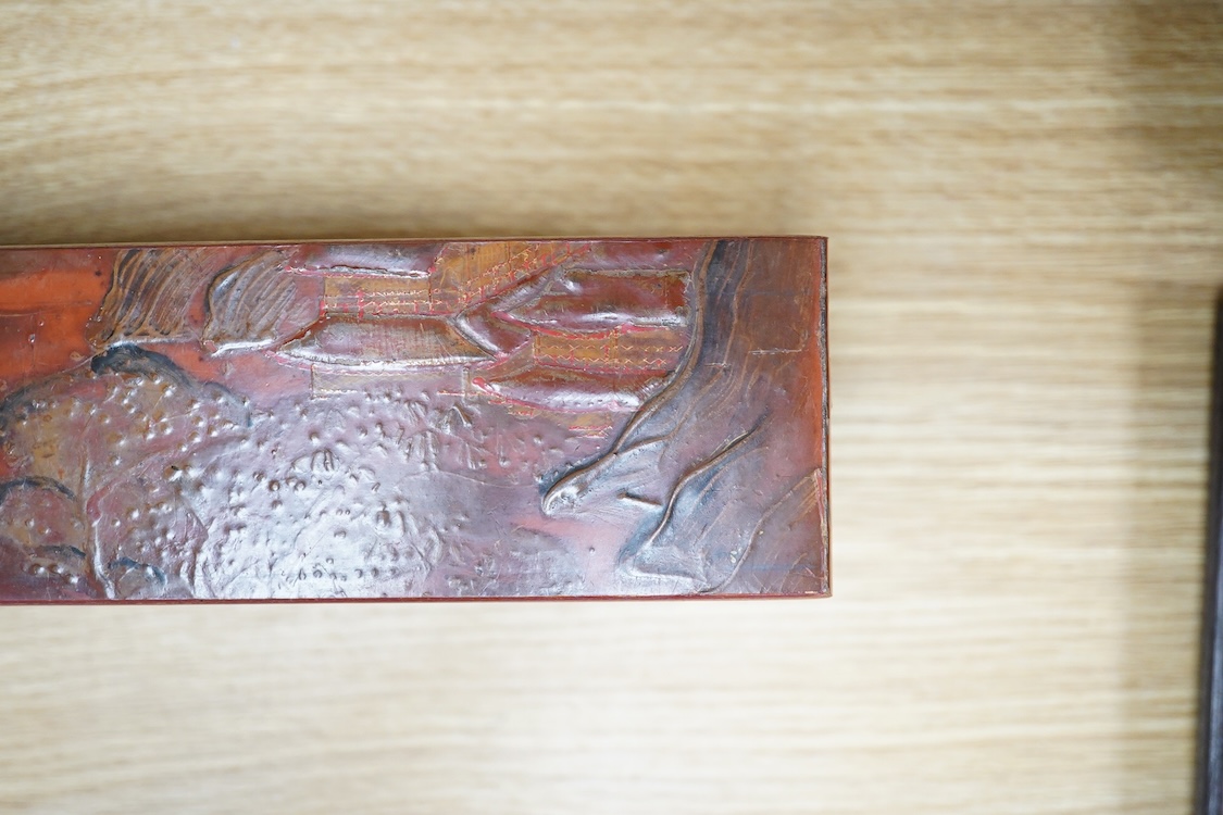 A Chinese red lacquered stand, 39cm wide